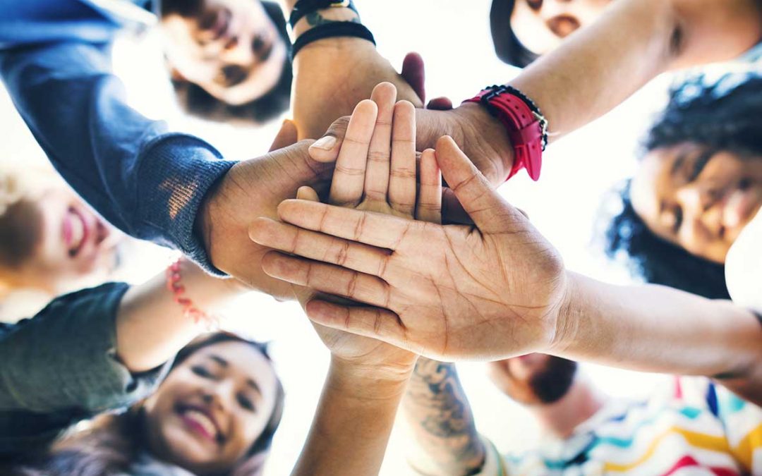 College Students Teamwork Stacking Hand Concept