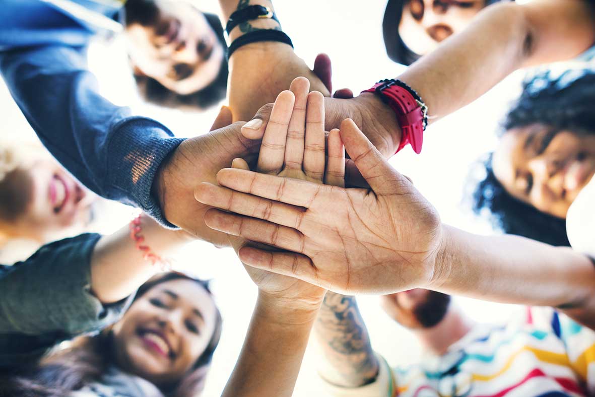 College Students Teamwork Stacking Hand Concept